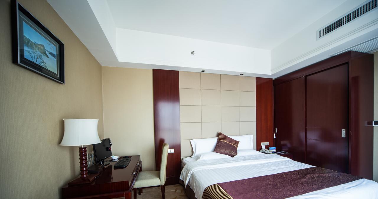 Da Cheng Shan Shui Hotel Чжанцзяцзе Номер фото